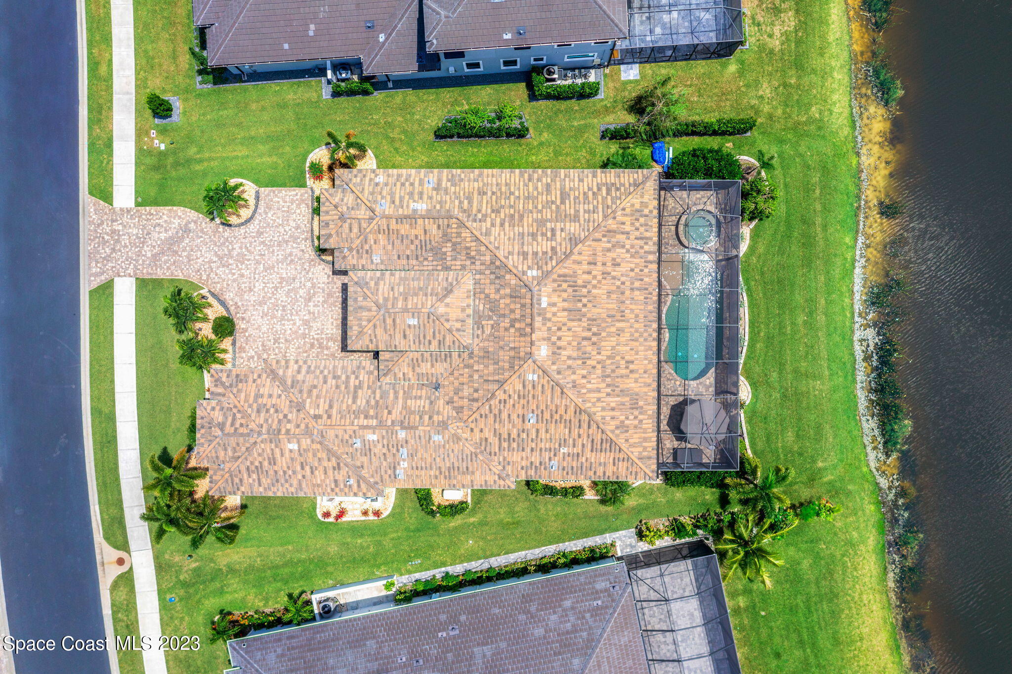 8429 Serrano Circle Melbourne, FL 32940 - Photo 26 of 28 a view of a garden with plants
