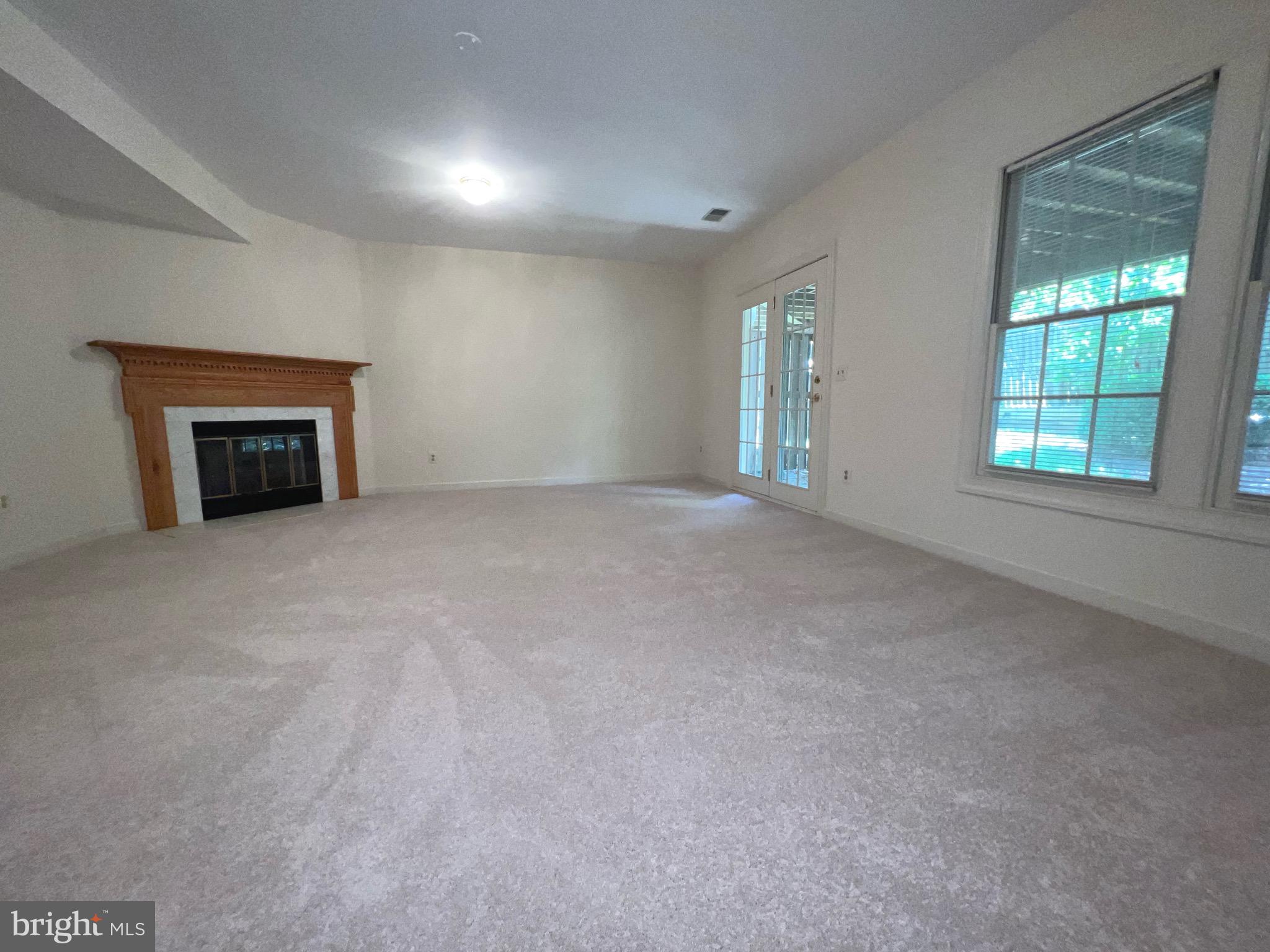 2104 Patty Lane Vienna, VA 22182 - Photo 16 of 19 an empty room with windows