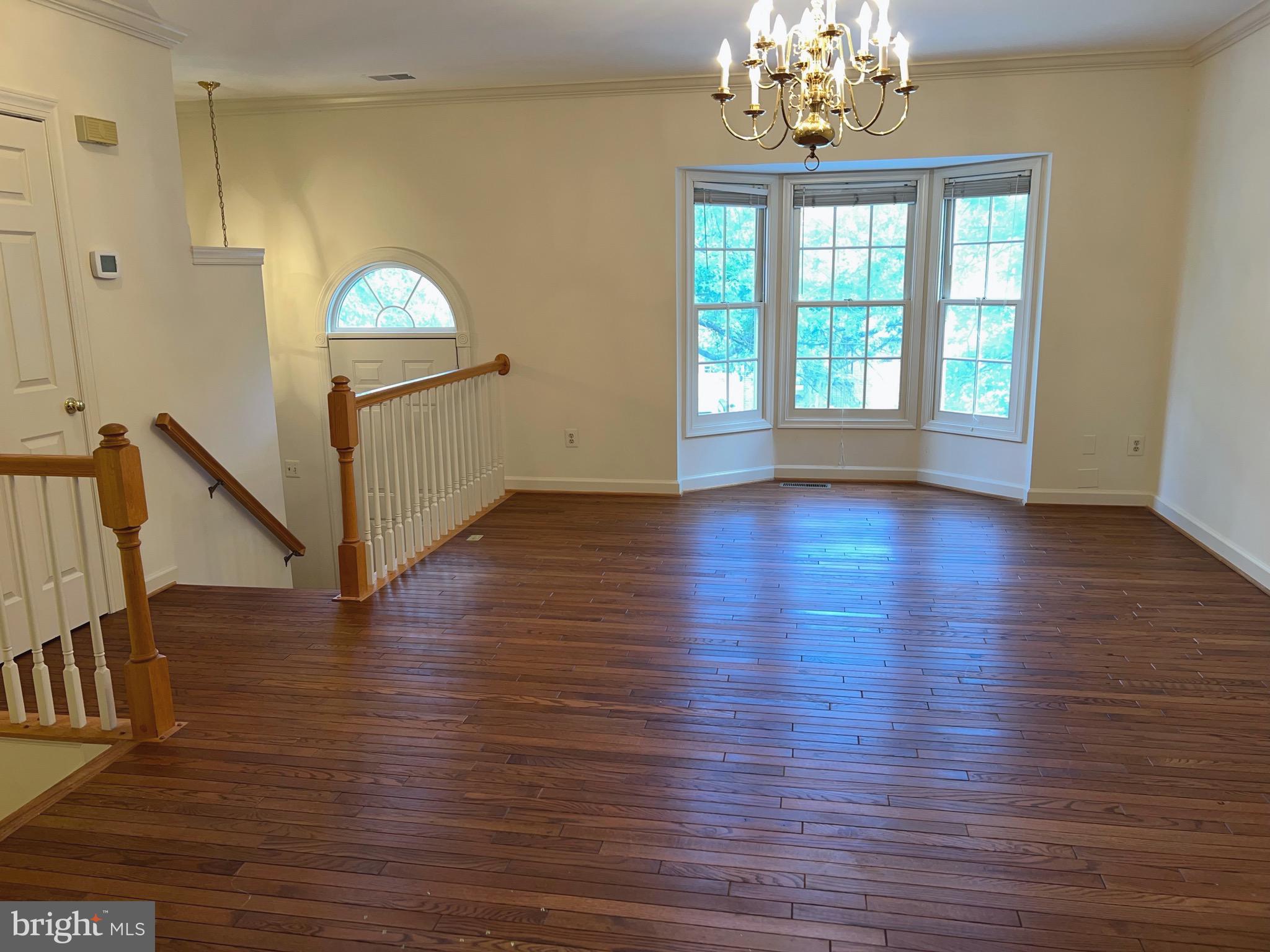 2104 Patty Lane Vienna, VA 22182 - Photo 2 of 19 a view of livingroom with window and wooden floor