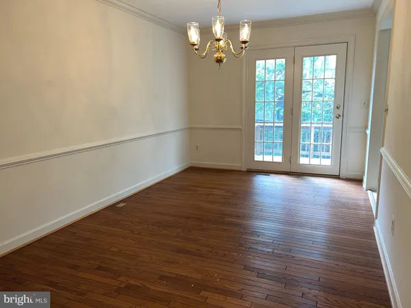 a view of deck with wooden floor and fence