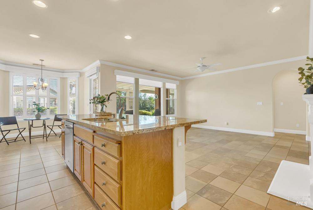 110 Foxwood Lane Rio Vista, CA 94571 - Photo 17 of 79 a kitchen with granite countertop a sink and a stove