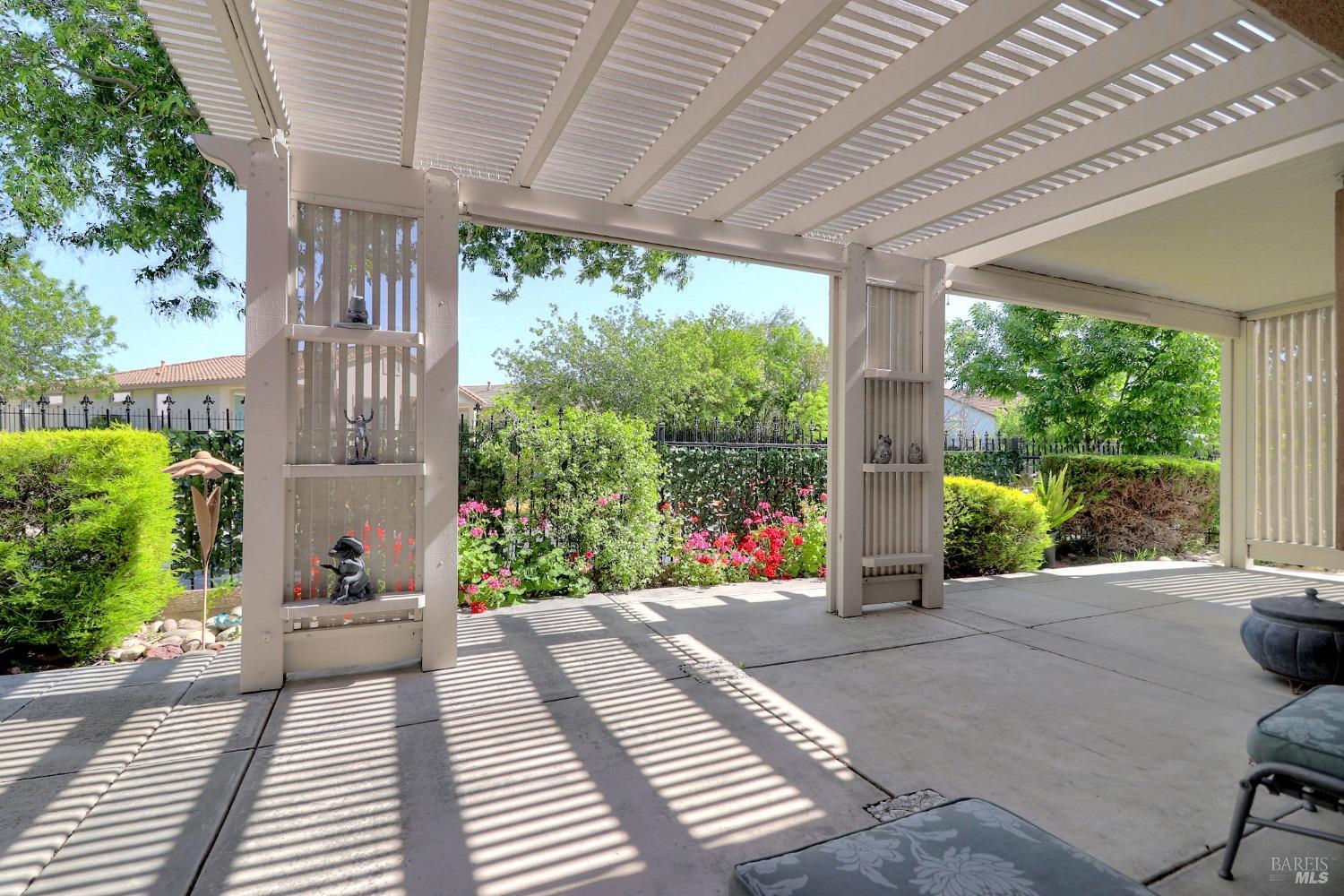 110 Foxwood Lane Rio Vista, CA 94571 - Photo 32 of 79 a view of a patio with table and chairs potted plants with wooden floor