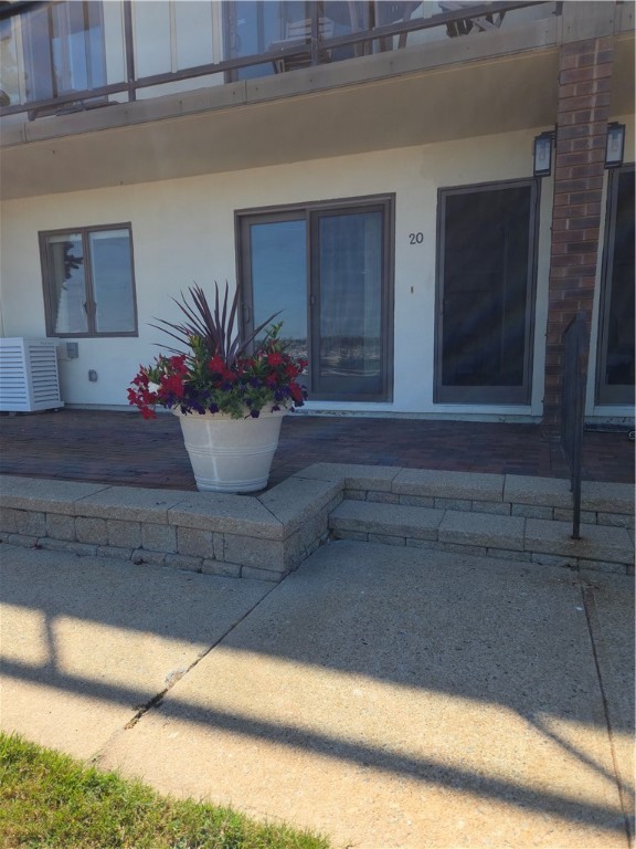 20 America Way, Unit B Newport, RI 02840 - Photo 23 of 25 Front door and outside paitio space