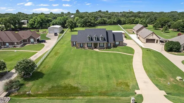 a view of a house with a big yard