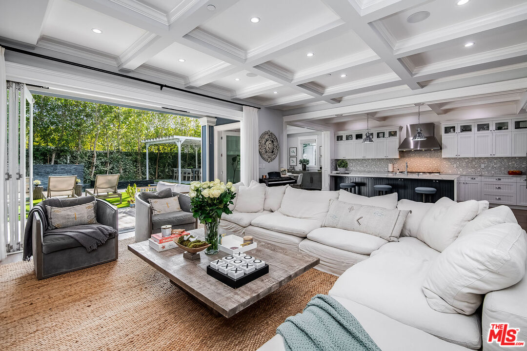 14920 Addison Street Sherman Oaks, CA 91403 - Photo 1 of 52 a living room with furniture or outdoor view and a large window