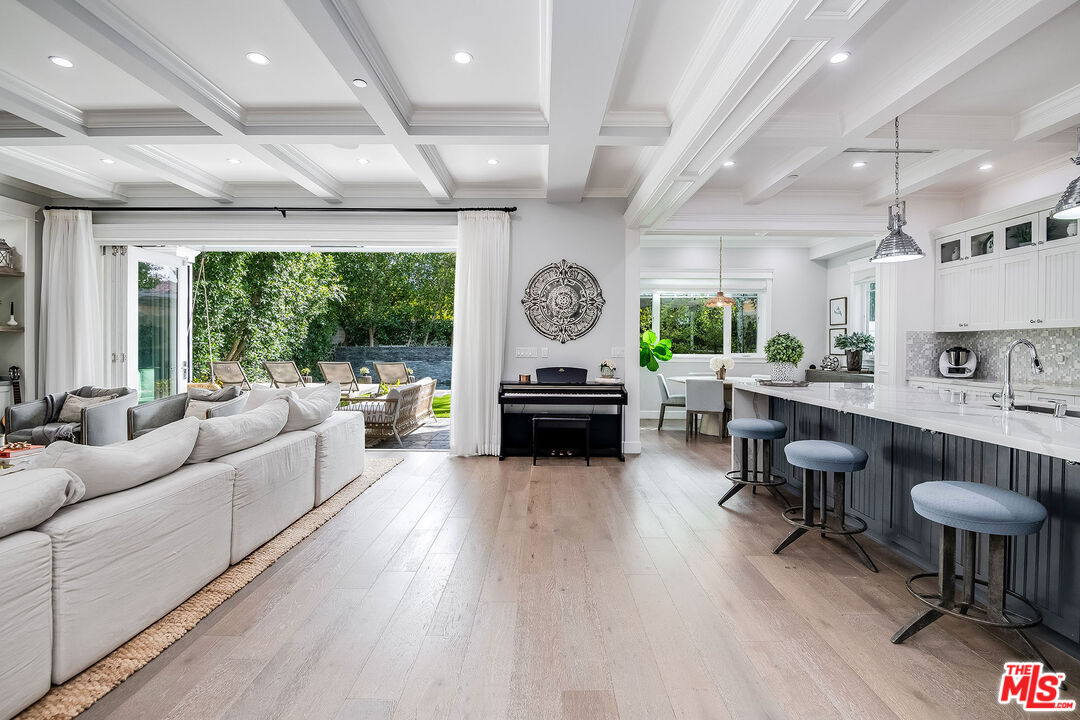 14920 Addison Street Sherman Oaks, CA 91403 - Photo 13 of 52 a living room with furniture and a large window
