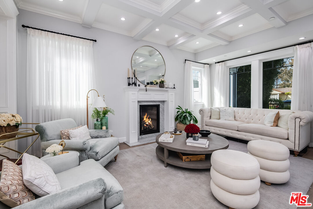 14920 Addison Street Sherman Oaks, CA 91403 - Photo 8 of 52 a living room with furniture and a fireplace