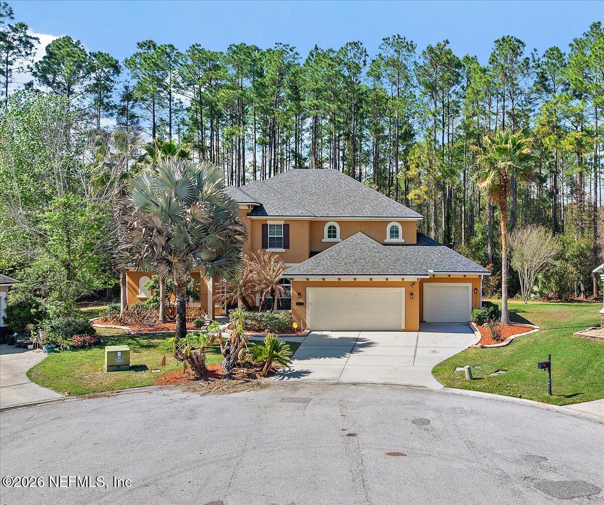 436 Chattan Way Fruit Cove, FL 32259 - Photo 1 of 41 front view of a house with a small yard