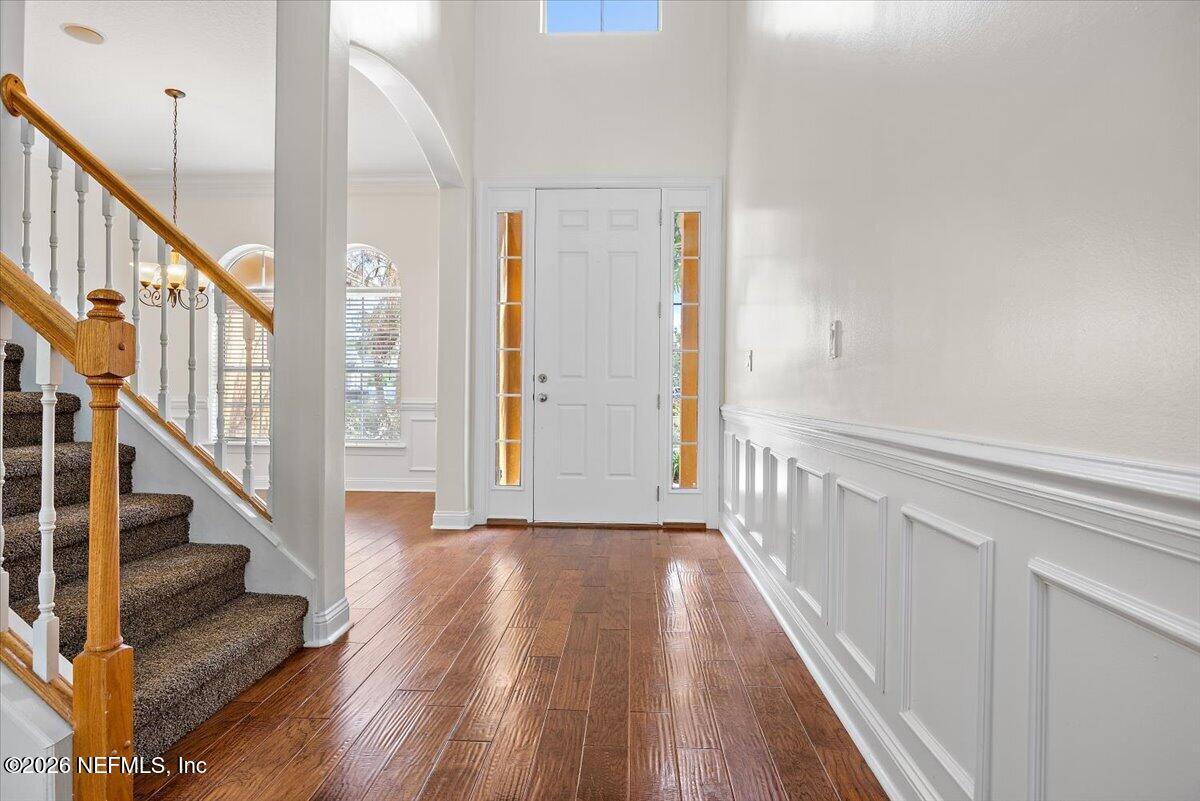 436 Chattan Way Fruit Cove, FL 32259 - Photo 18 of 41 a view of staircase with wooden floor and staircase