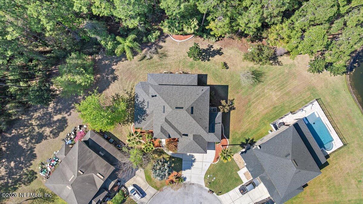 436 Chattan Way Fruit Cove, FL 32259 - Photo 36 of 41 an aerial view of a house with a yard and lake view