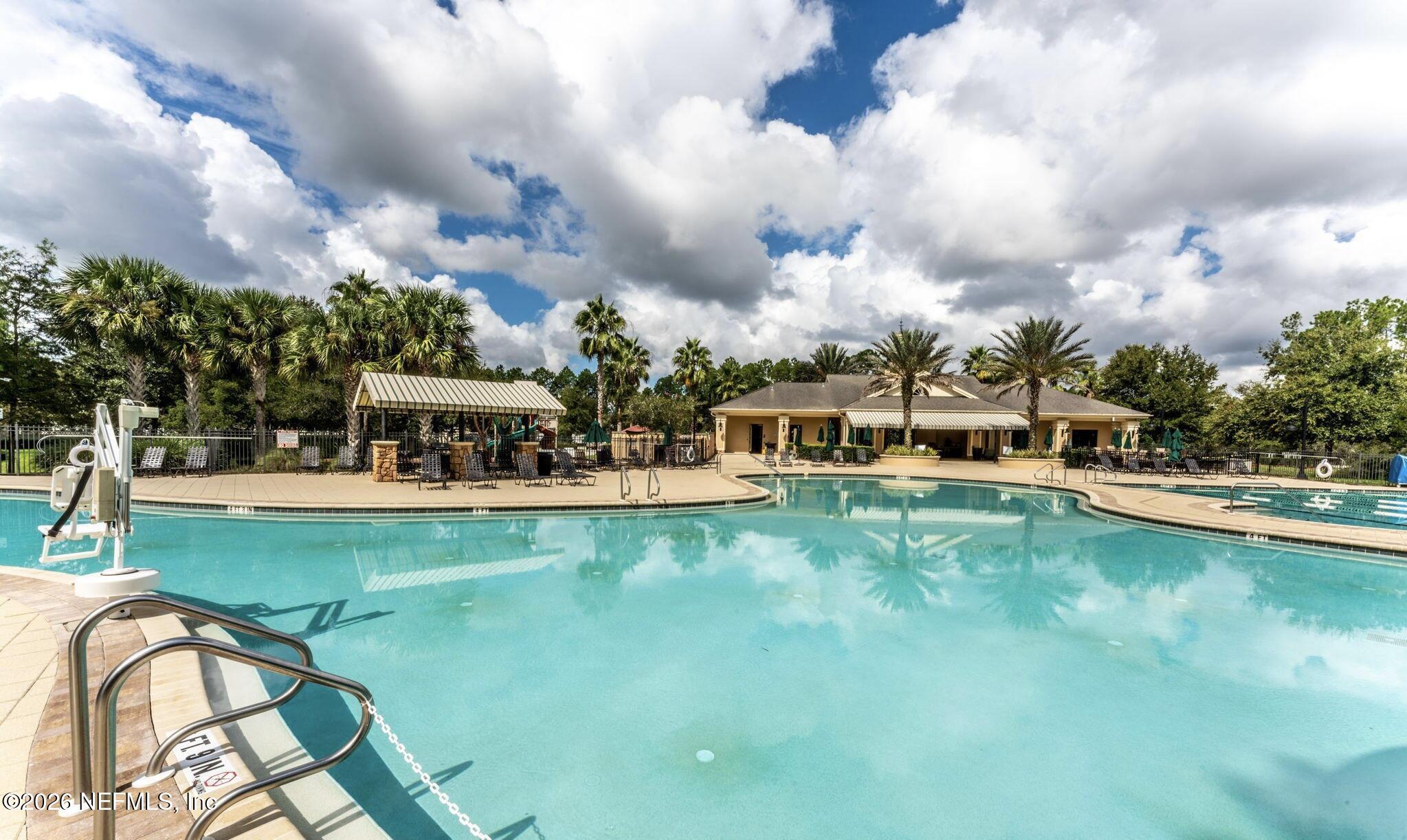 436 Chattan Way Fruit Cove, FL 32259 - Photo 41 of 41 a view of a swimming pool with a garden