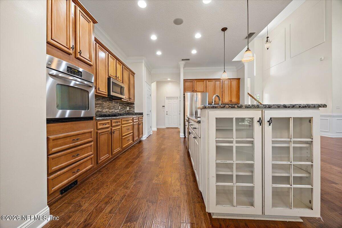 436 Chattan Way Fruit Cove, FL 32259 - Photo 10 of 41 a kitchen with stainless steel appliances a stove and a refrigerator