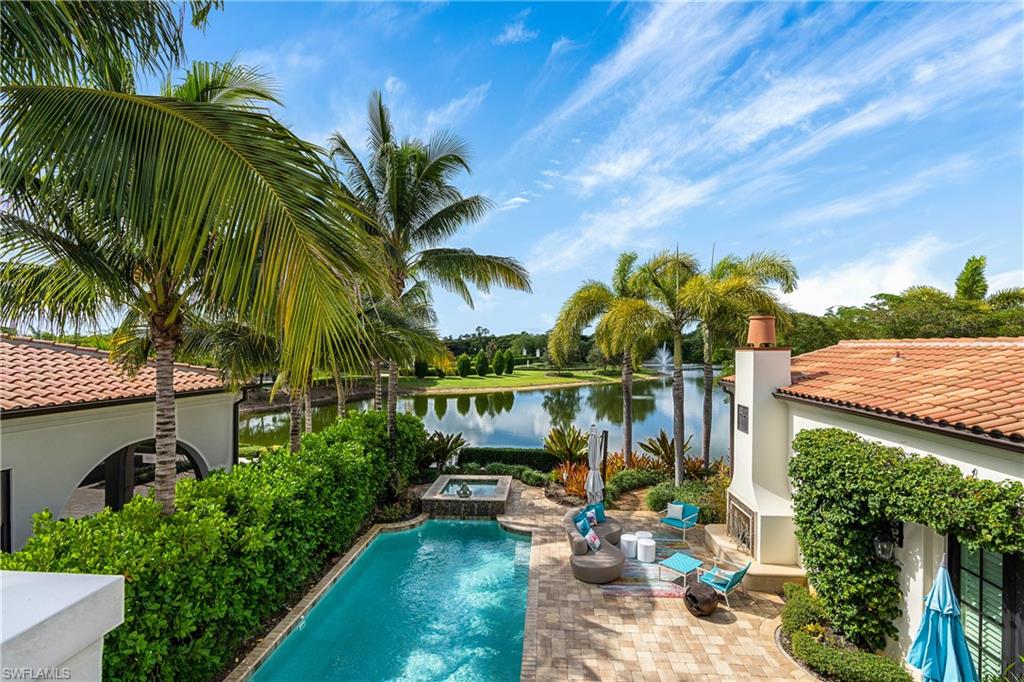 16727 Lucarno Way Naples, FL 34110 - Photo 20 of 36 a view of swimming pool with a patio