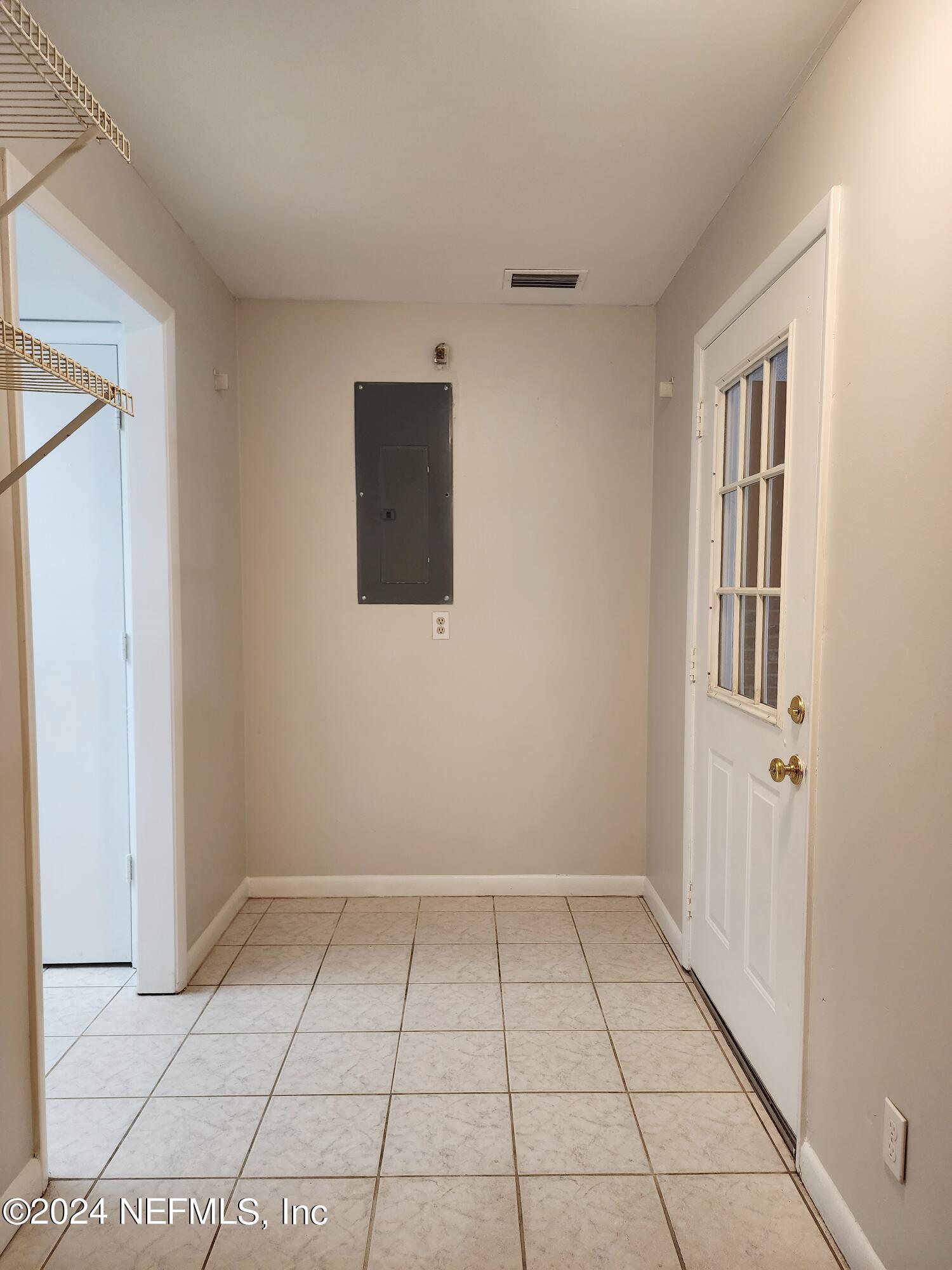 8423 Graybar Drive Jacksonville, FL 32221 - Photo 15 of 29 a view of an empty room with window