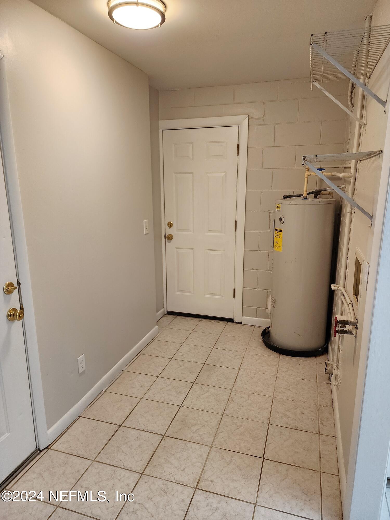 8423 Graybar Drive Jacksonville, FL 32221 - Photo 16 of 29 a view of a storage & utility room