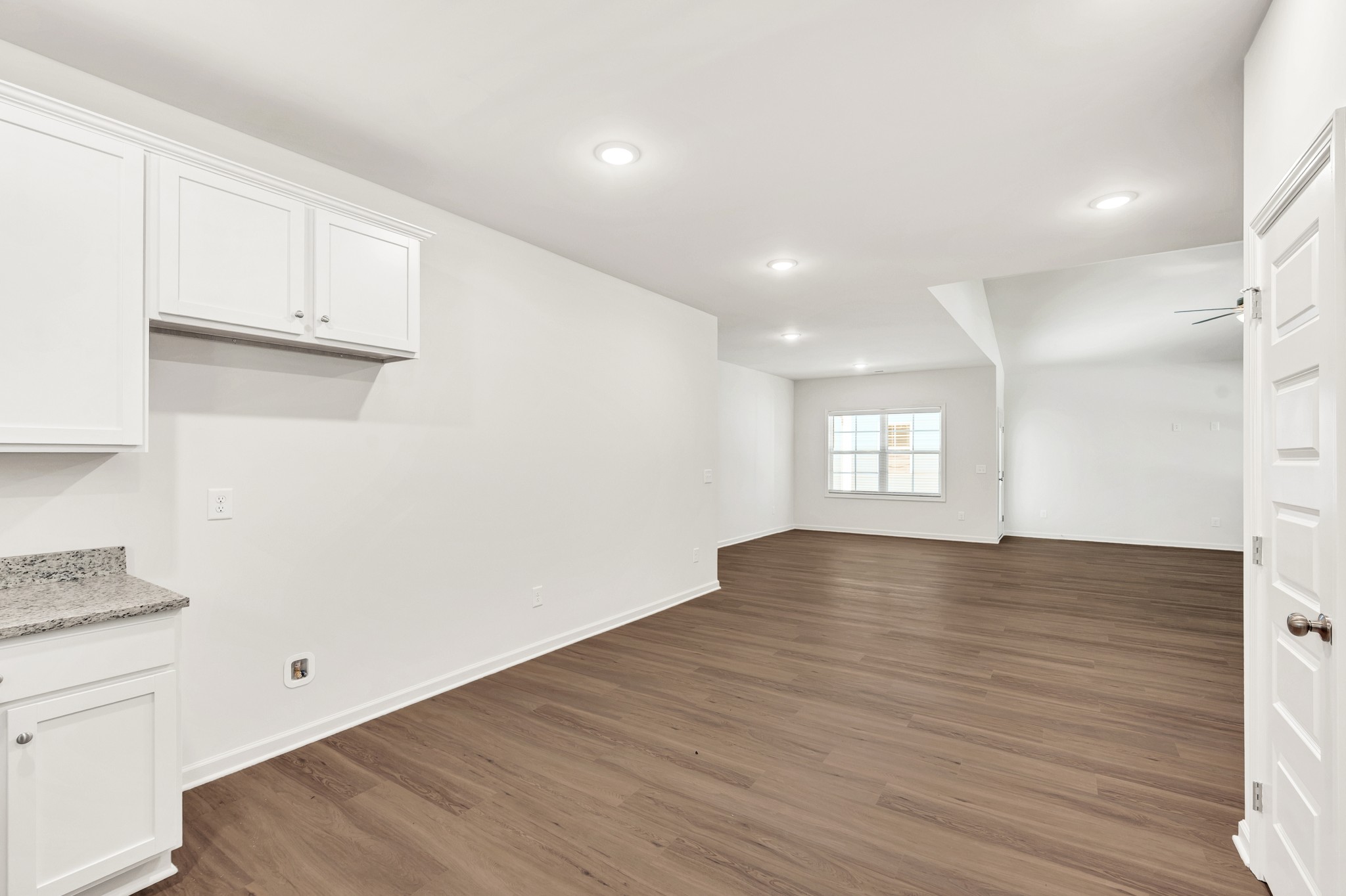 7091 Wiley Circle Fairview, TN 37062 - Photo 15 of 32 a view of empty room with wooden floor and window