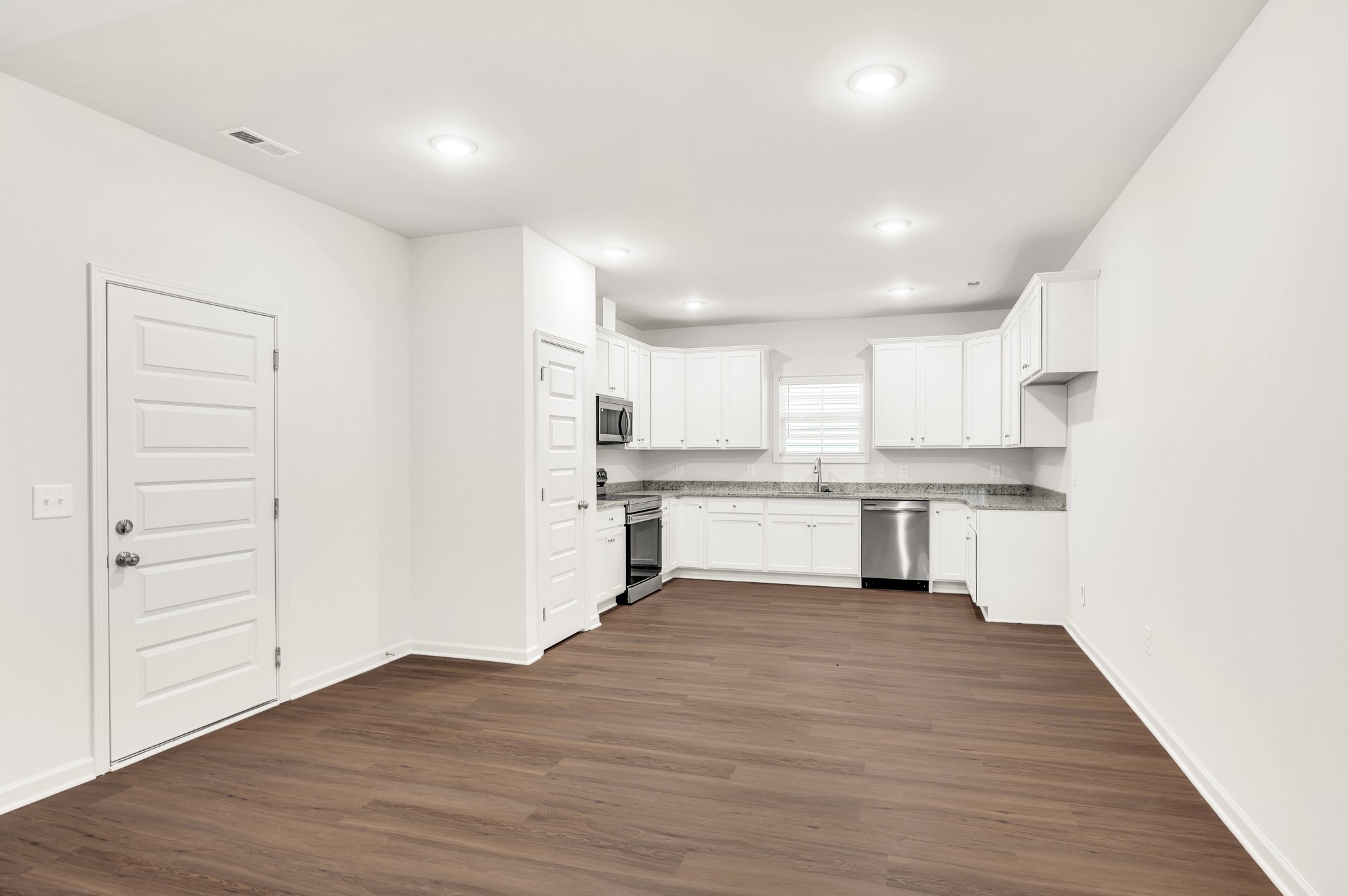 7091 Wiley Circle Fairview, TN 37062 - Photo 10 of 32 a view of kitchen with wooden floor