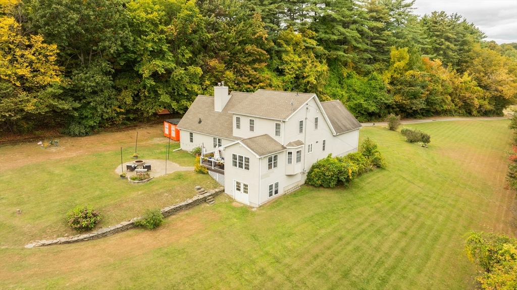 2 South County Road Leyden, MA 01301 - Photo 1 of 42 an aerial view of a house with swimming pool and large trees