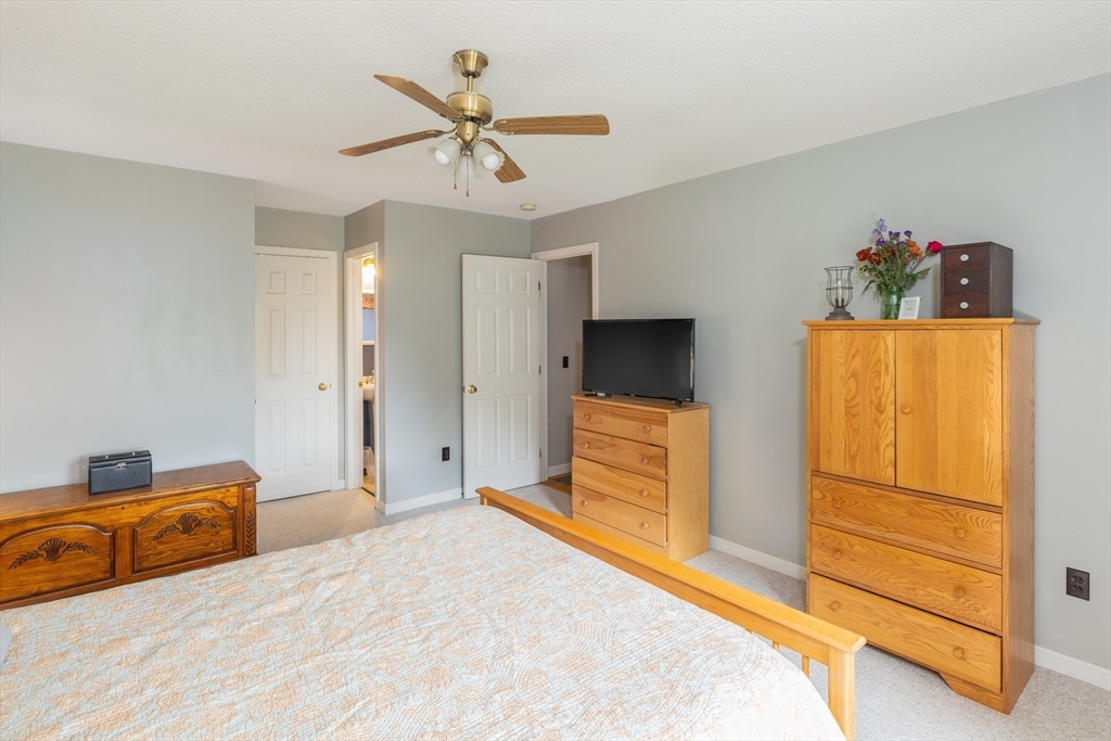 2 South County Road Leyden, MA 01301 - Photo 19 of 42 a bedroom with a bed and wooden floor