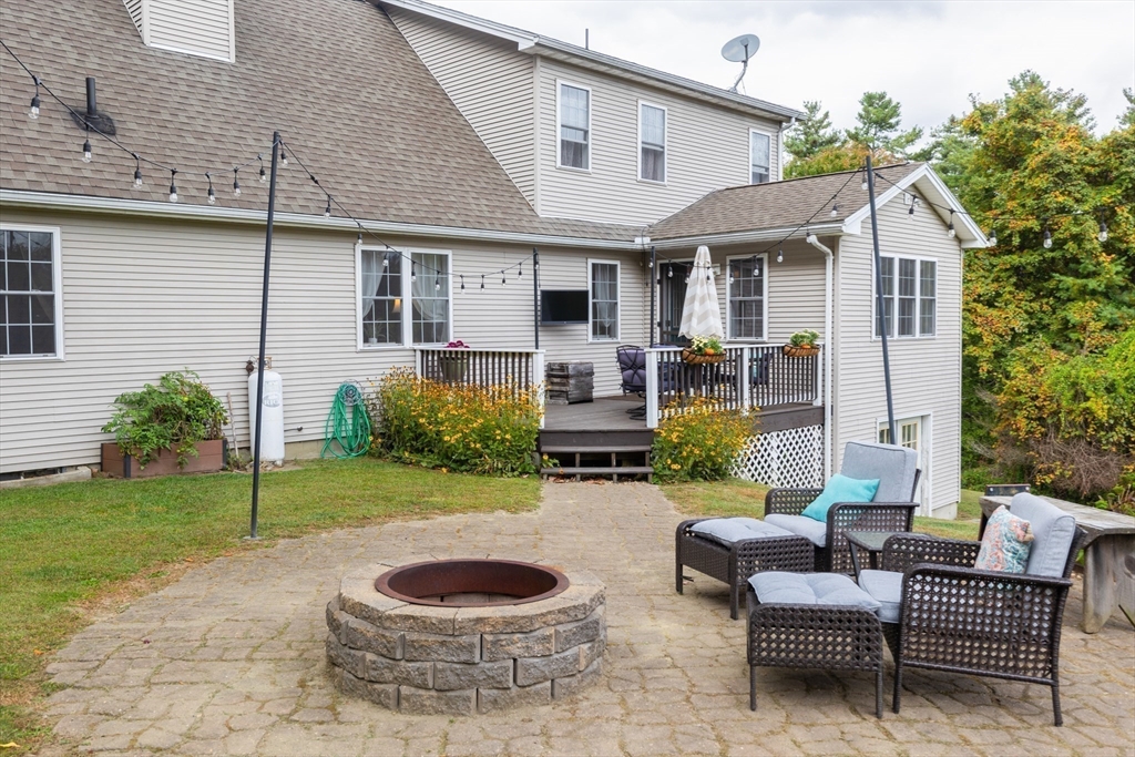 2 South County Road Leyden, MA 01301 - Photo 35 of 42 a view of a house with backyard and sitting area