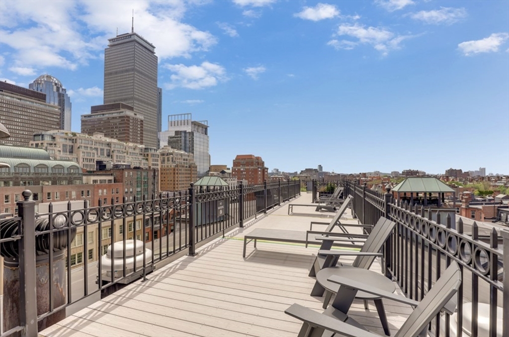 201 Newbury Street, Unit 405 Boston, MA 02116 - Photo 13 of 17 a view of a roof deck with couches