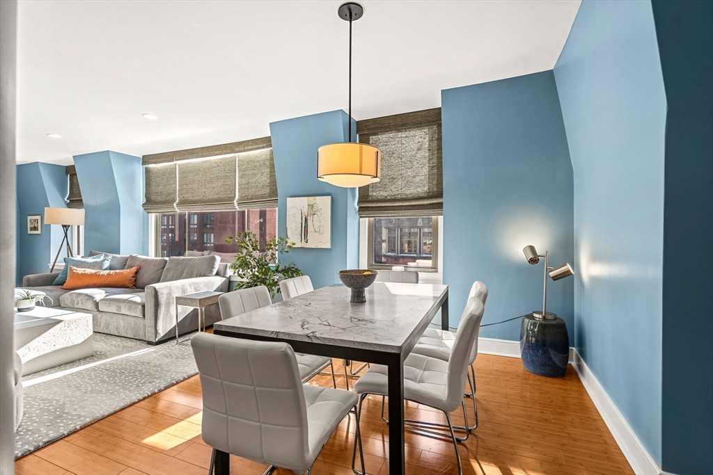201 Newbury Street, Unit 405 Boston, MA 02116 - Photo 4 of 17 a dining room with furniture and window