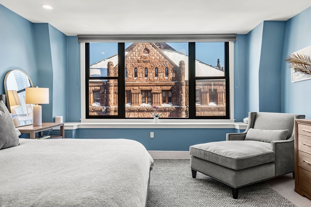 201 Newbury Street, Unit 405 Boston, MA 02116 - Photo 6 of 17 a living room with furniture and a large window