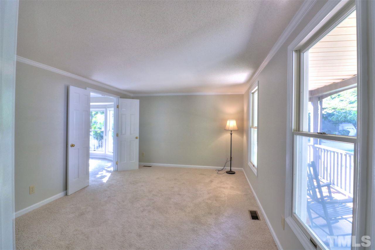 1909 Summerlyn Court Raleigh, NC 27609 - Photo 2 of 24 a view of entryway with window