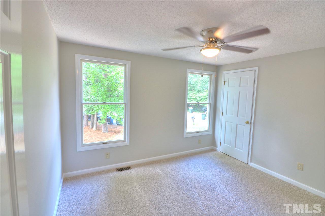 1909 Summerlyn Court Raleigh, NC 27609 - Photo 16 of 24 a view of an empty room with a window