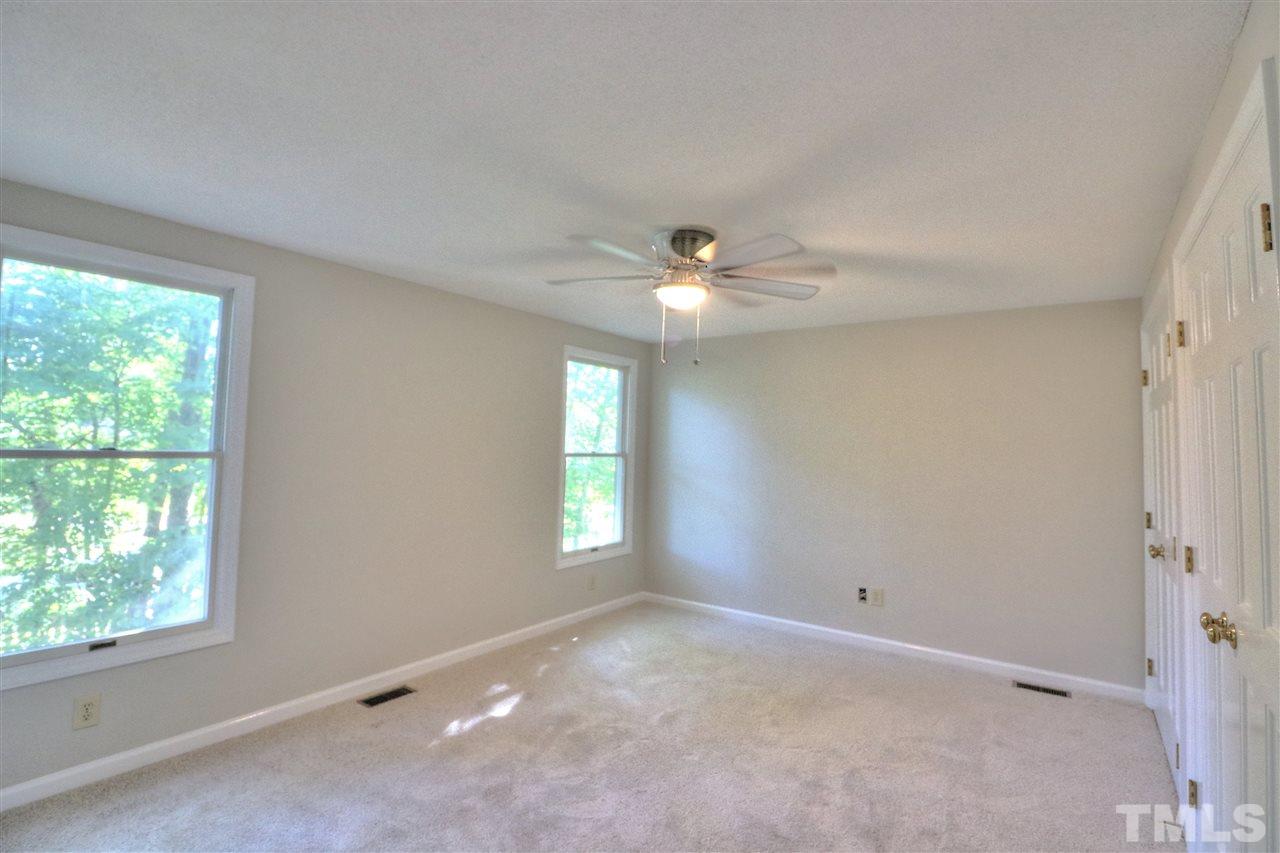 1909 Summerlyn Court Raleigh, NC 27609 - Photo 20 of 24 a view of an empty room with a window