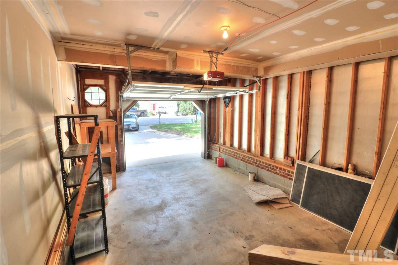 1909 Summerlyn Court Raleigh, NC 27609 - Photo 21 of 24 a view of a room with gym equipment