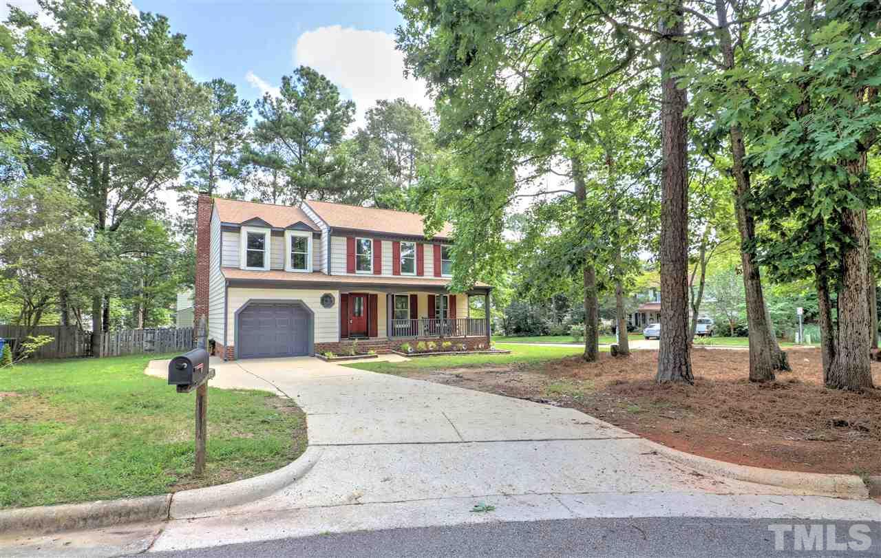 1909 Summerlyn Court Raleigh, NC 27609 - Photo 24 of 24 a front view of a house with a yard and trees