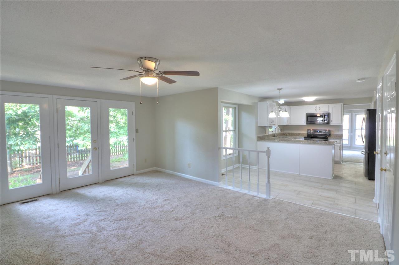 1909 Summerlyn Court Raleigh, NC 27609 - Photo 8 of 24 a view of an empty room with a window