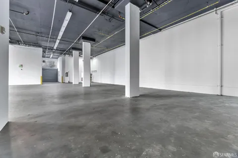 a view of a room with wooden walls