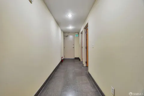 a front view of a building with street view