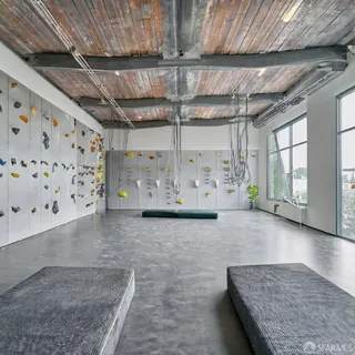 a view of a storage room with a table and a chair