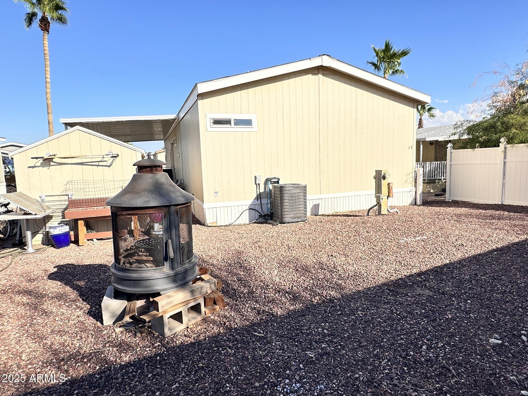 2000 South Apache Road, Unit 126 Buckeye, AZ 85326 - Photo 22 of 29 a house view with a sitting space