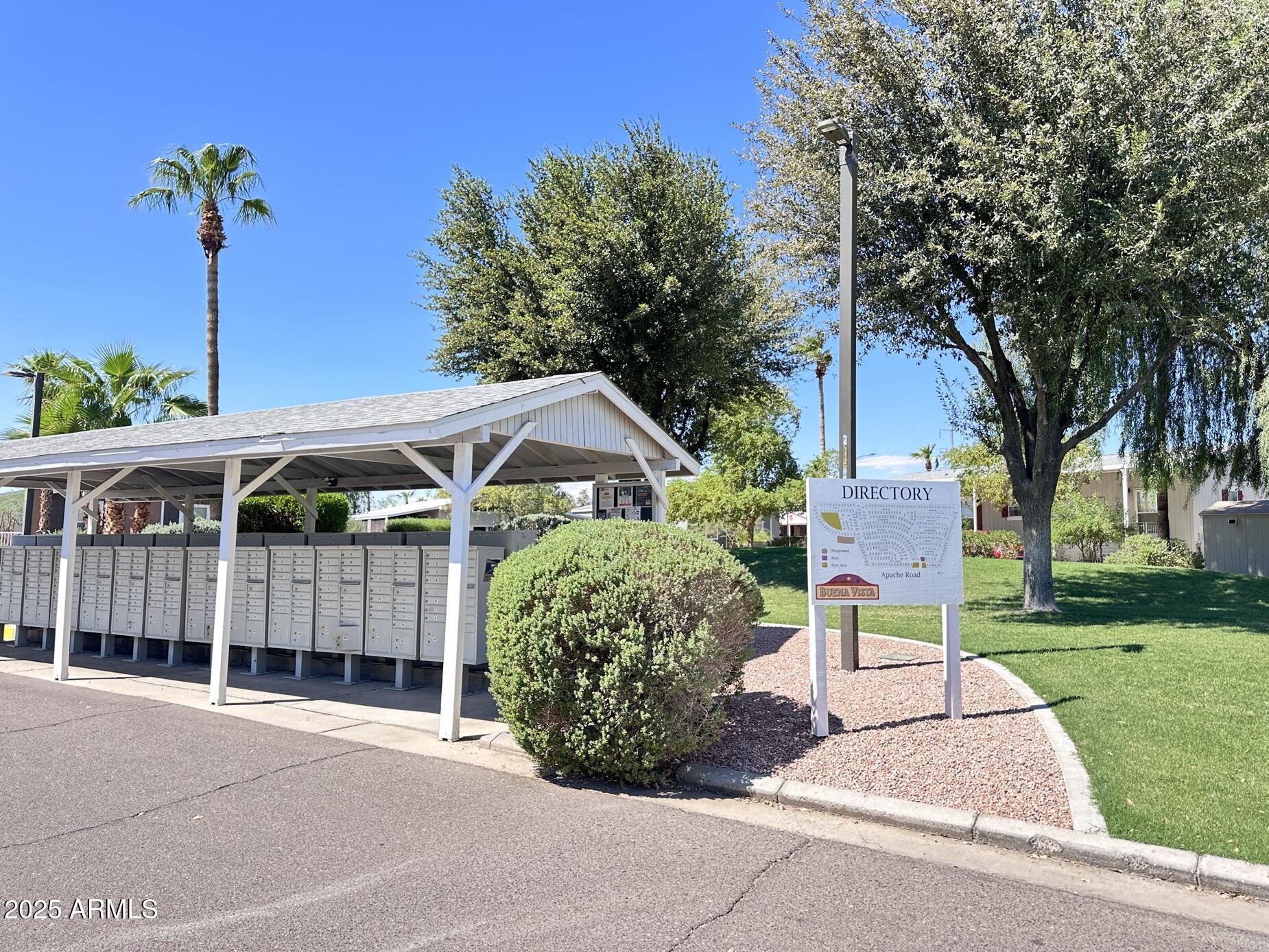 2000 South Apache Road, Unit 126 Buckeye, AZ 85326 - Photo 25 of 29 a front view of a house with garden