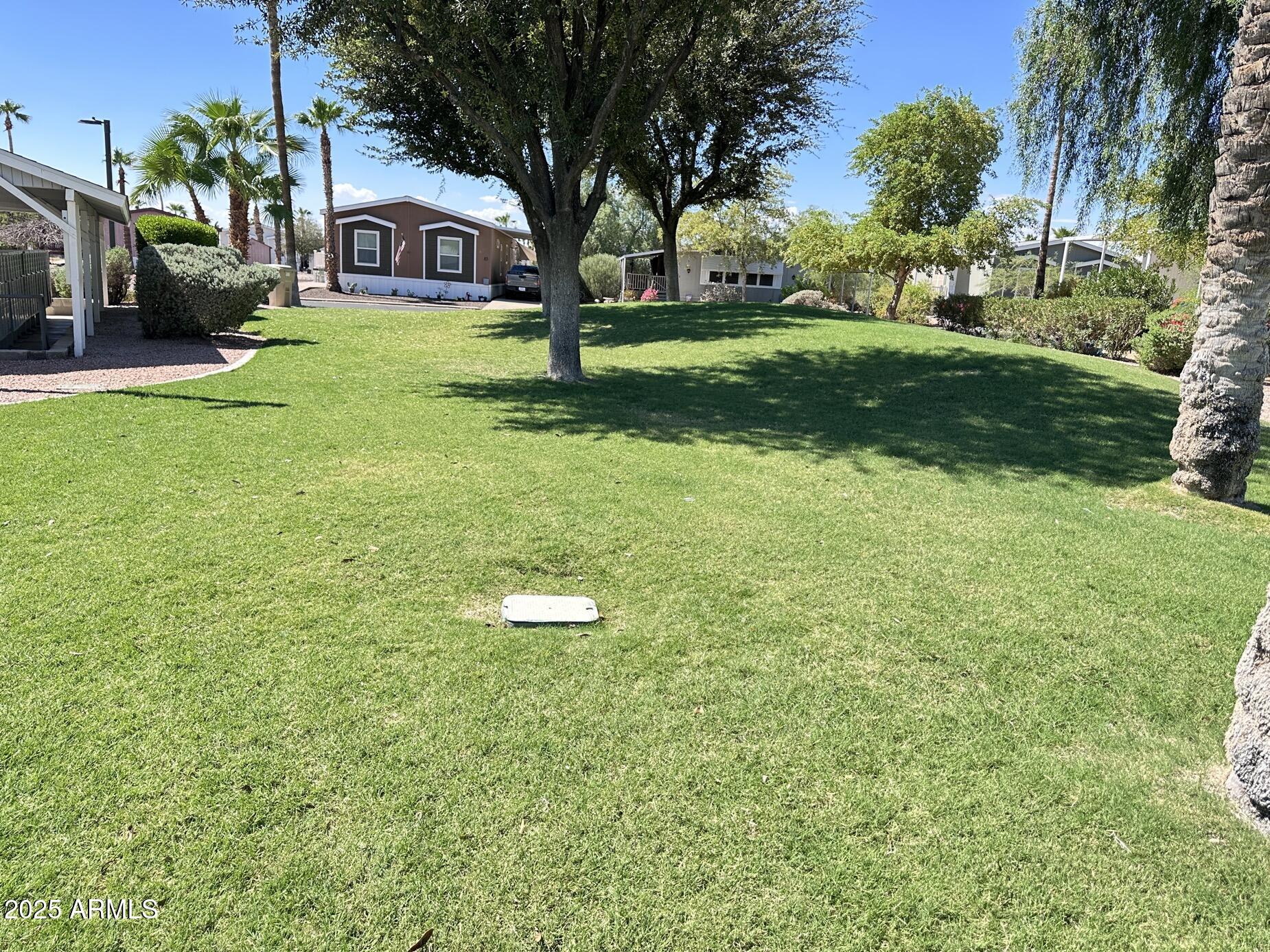 2000 South Apache Road, Unit 126 Buckeye, AZ 85326 - Photo 26 of 29 a view of a house with a yard