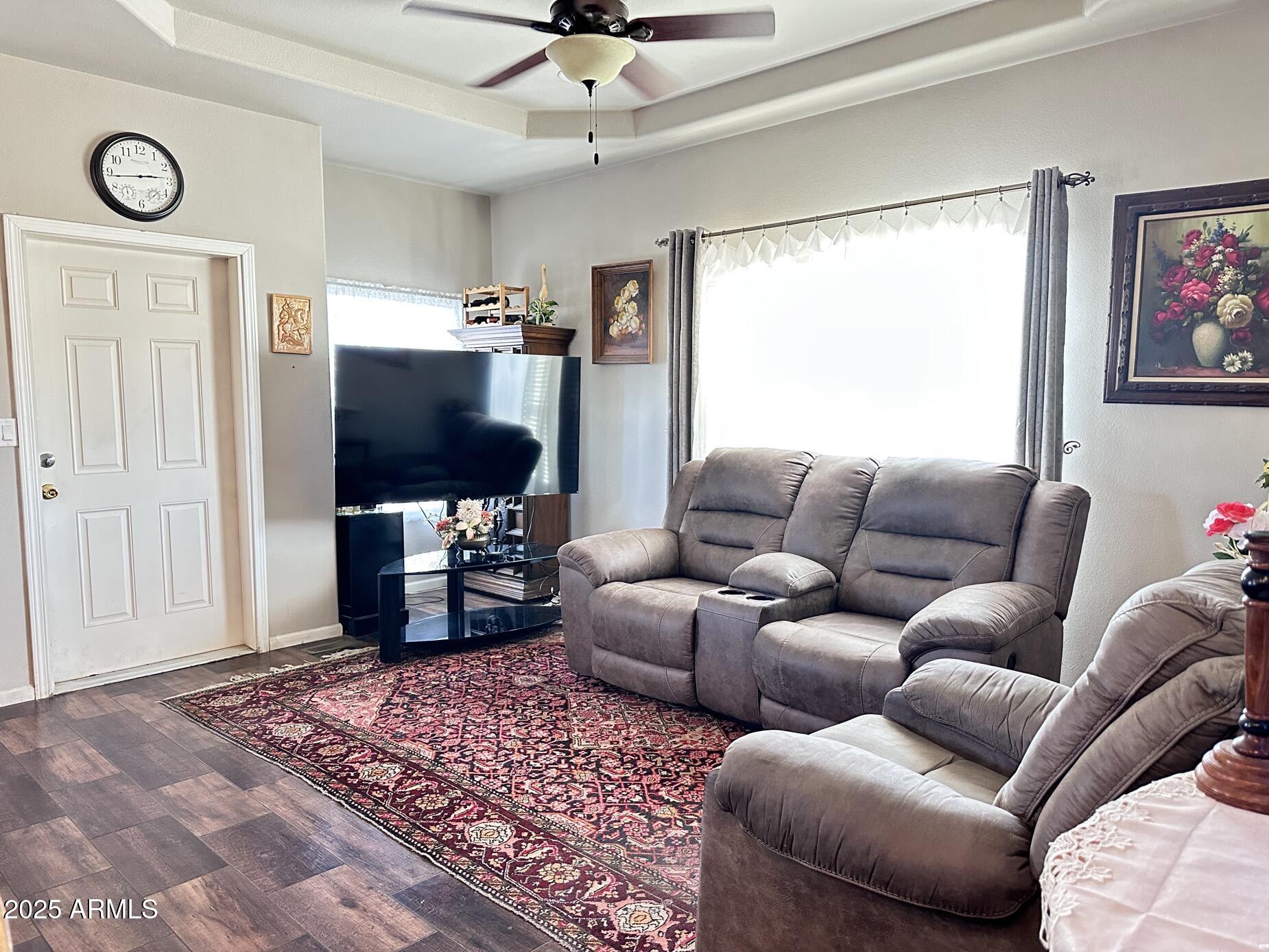 2000 South Apache Road, Unit 126 Buckeye, AZ 85326 - Photo 10 of 29 a living room with furniture and a flat screen tv