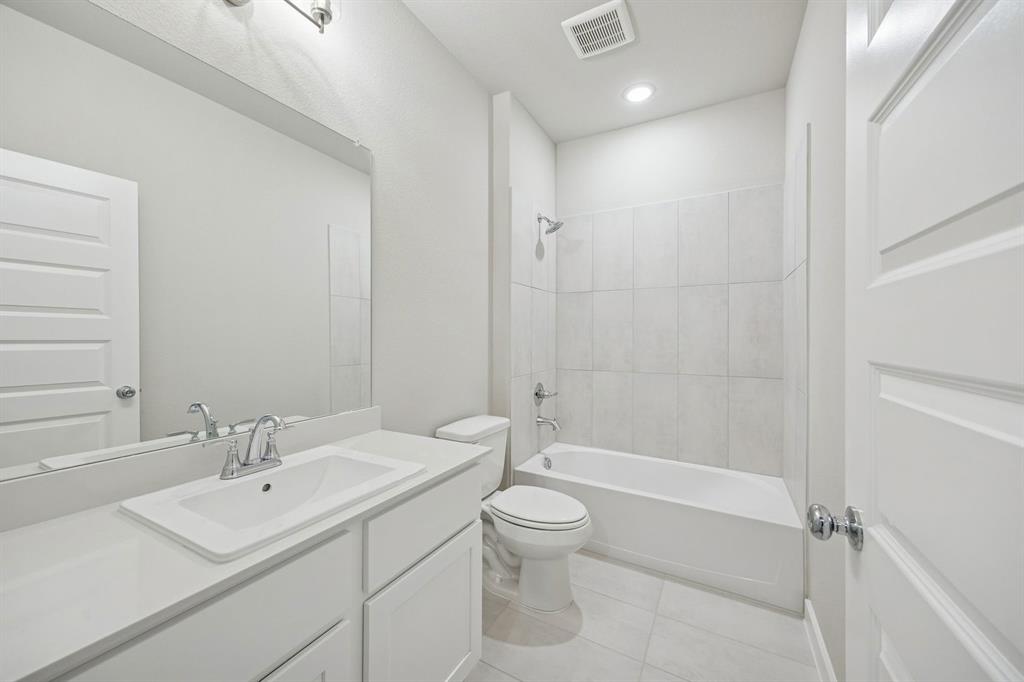 2109 Sunshining Road Princeton, TX 75407 - Photo 28 of 35 Bathroom in the Stanley II home plan by Trophy Signature Homes – REPRESENTATIVE PHOTO