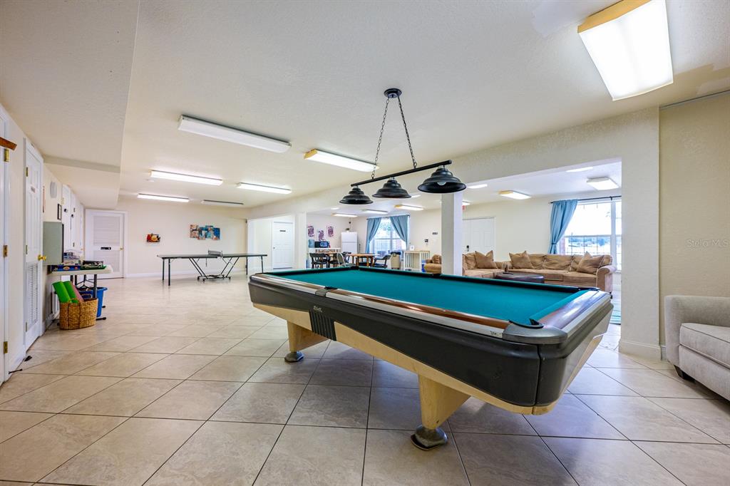 4224 Lake Underhill Road, Unit 8B5 Orlando, FL 32803 - Photo 25 of 40 a room with lots of tables and chairs