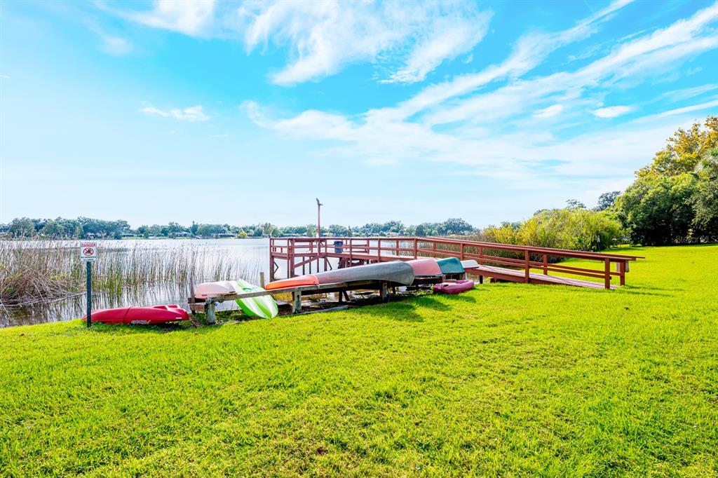 4224 Lake Underhill Road, Unit 8B5 Orlando, FL 32803 - Photo 30 of 40 a view of a golf course with a lake view