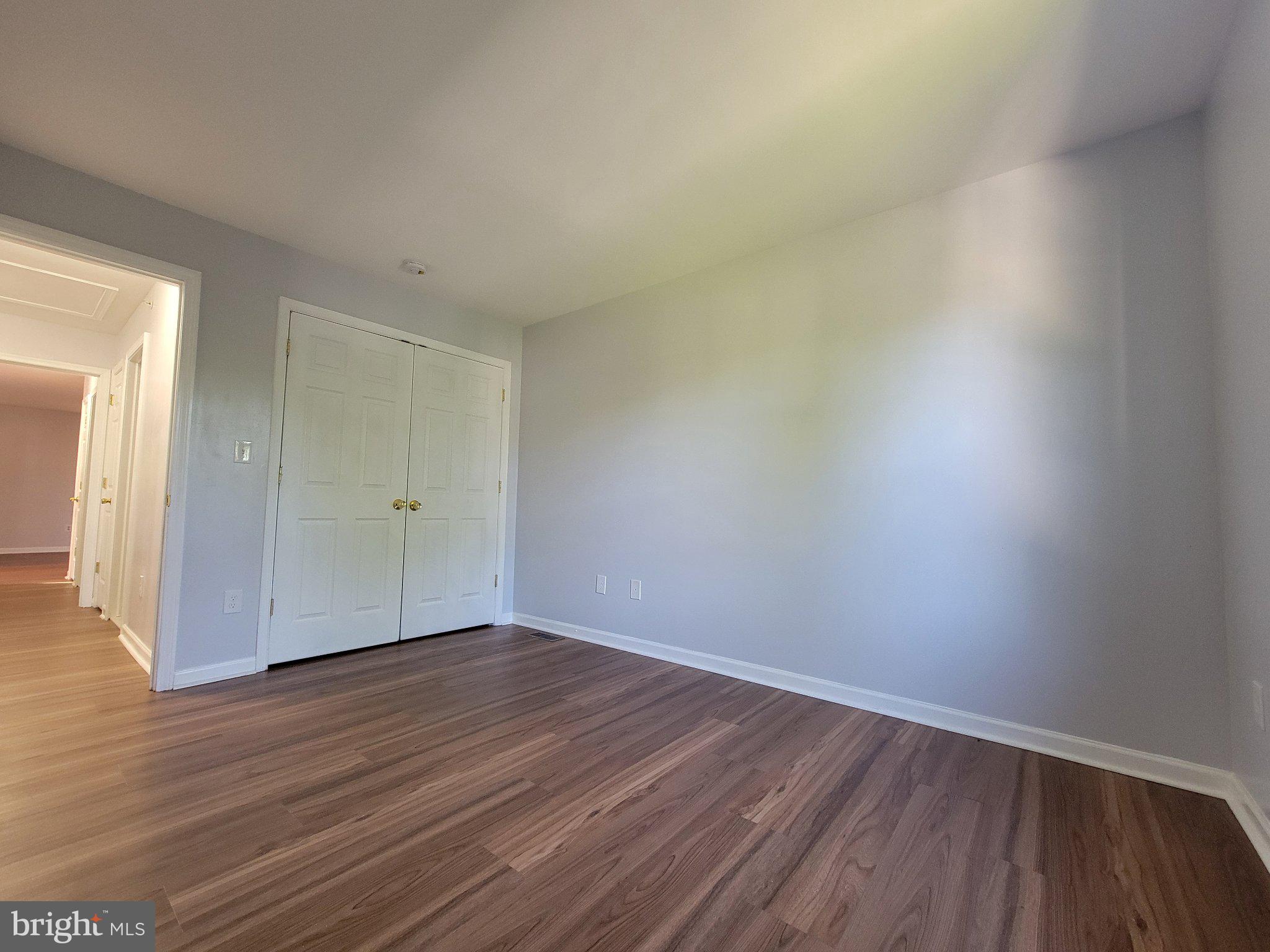 97 Spring Street Trenton, NJ 08618 - Photo 14 of 16 Spacious room with natural light.