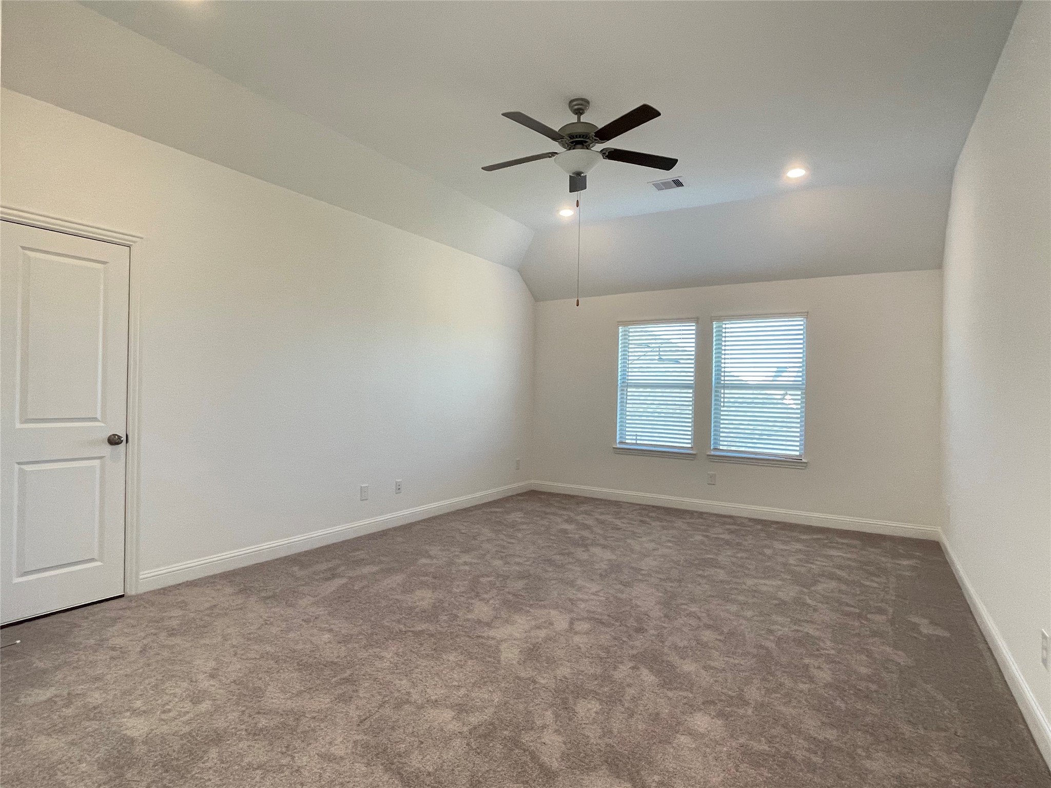 29806 Cherry Vine Road Katy, TX 77494 - Photo 17 of 30 an empty room with windows and fan