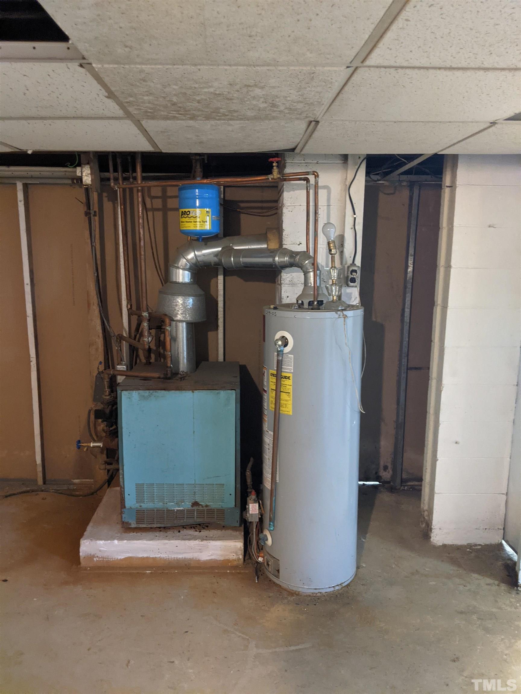 102 Dee Long Road Roxboro, NC 27574 - Photo 15 of 21 a view of water heater room