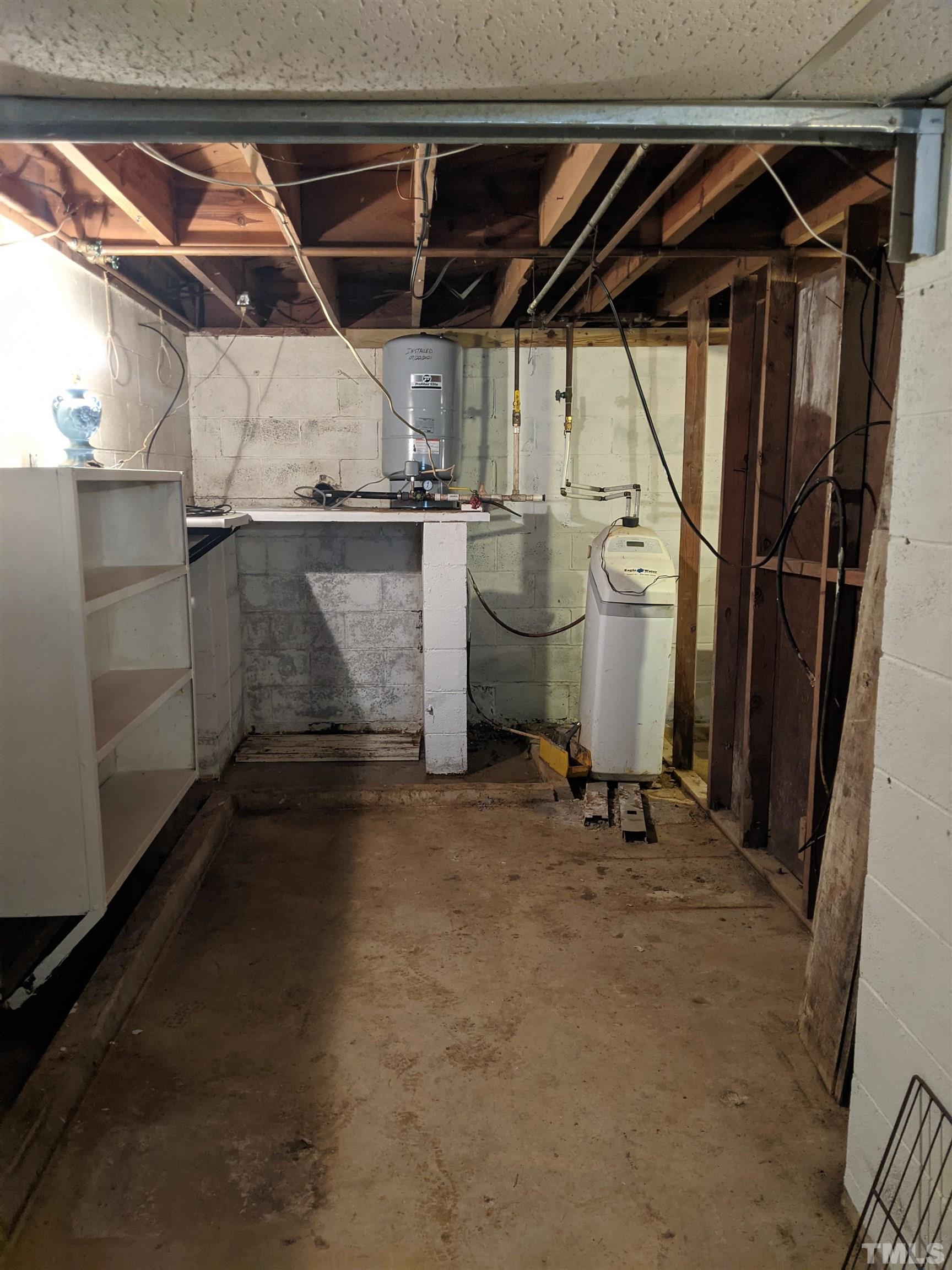 102 Dee Long Road Roxboro, NC 27574 - Photo 17 of 21 a view of water heater room