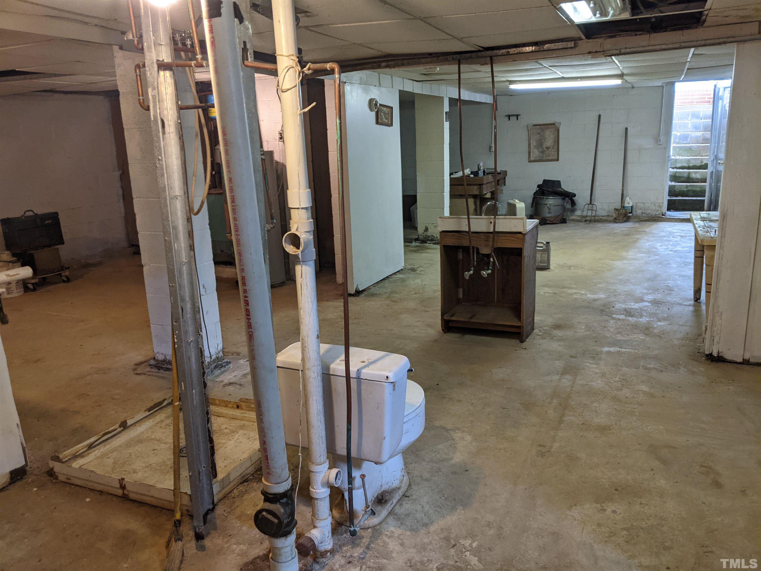 102 Dee Long Road Roxboro, NC 27574 - Photo 19 of 21 a view of a room with gym equipment