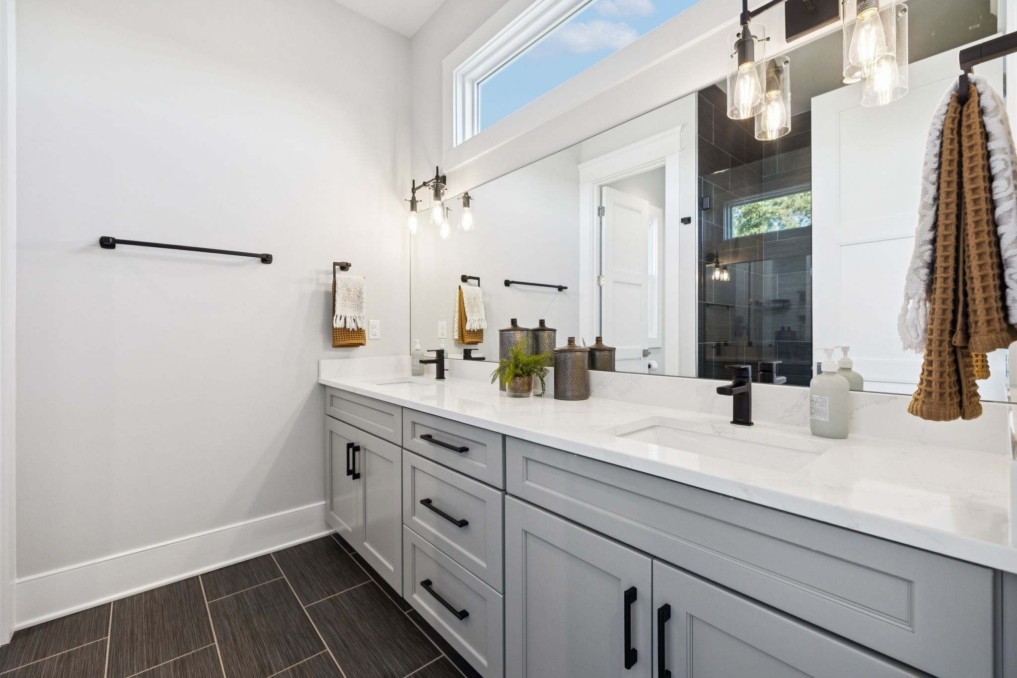 809 Burton Point Road Mount Juliet, TN 37122 - Photo 29 of 75 a bathroom with a sink and a mirror