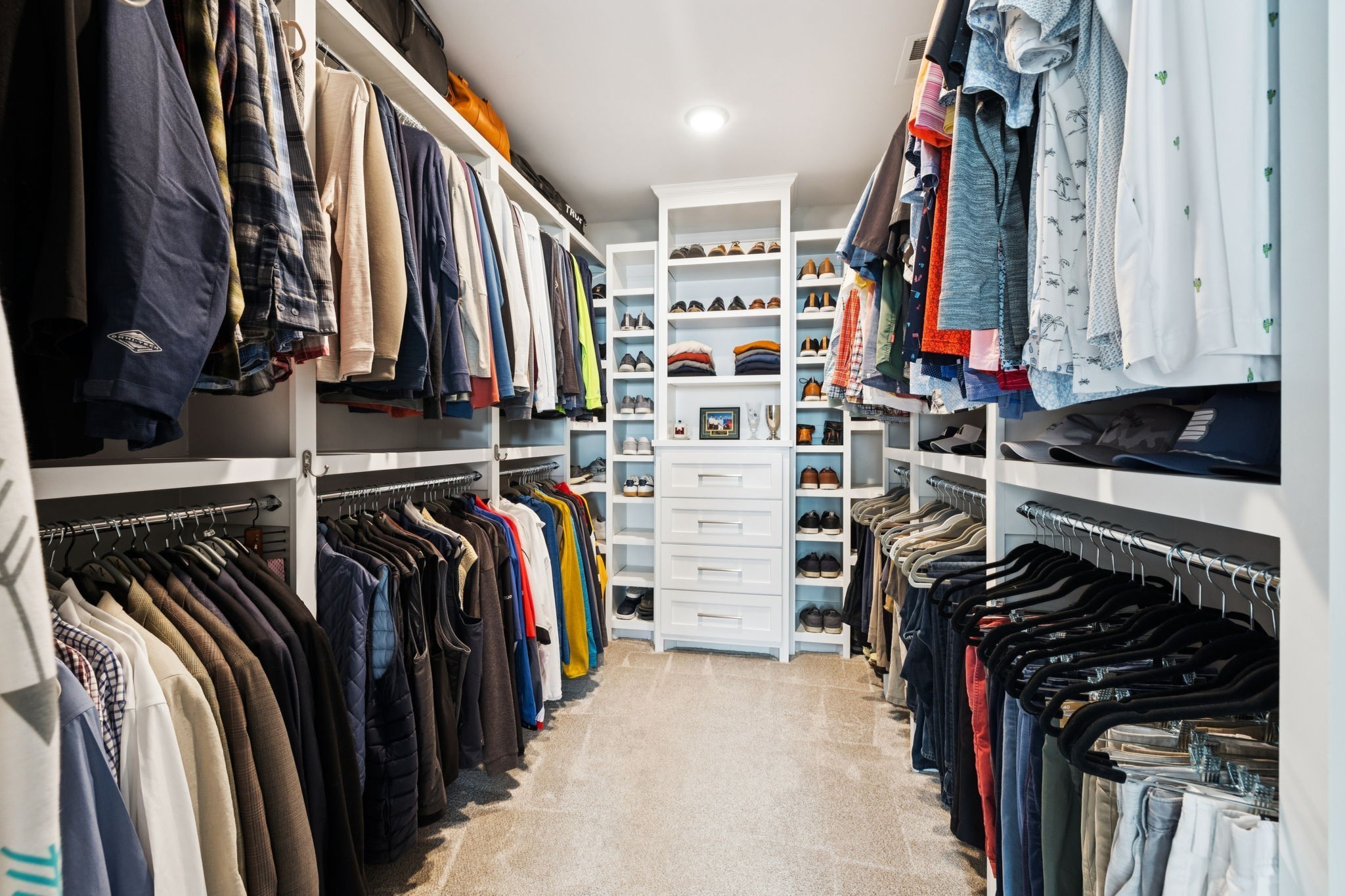 809 Burton Point Road Mount Juliet, TN 37122 - Photo 35 of 57 a view of walk in closet with clothes and shoes